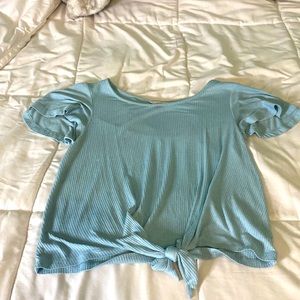 this is a blue shirt from the brand candies